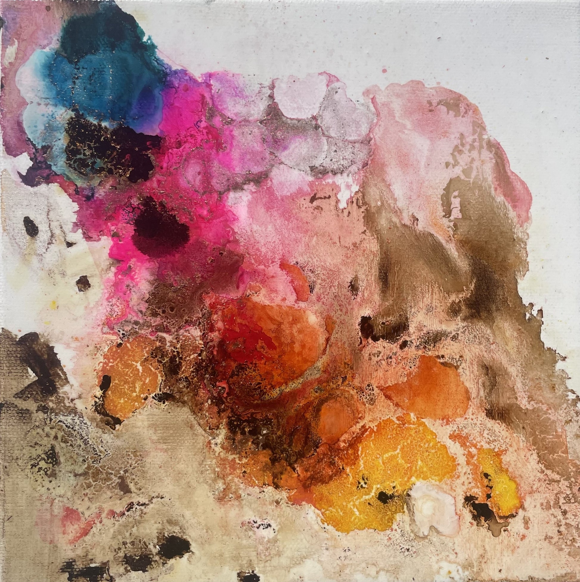 Abstract art with colorful splashes on a textured surface